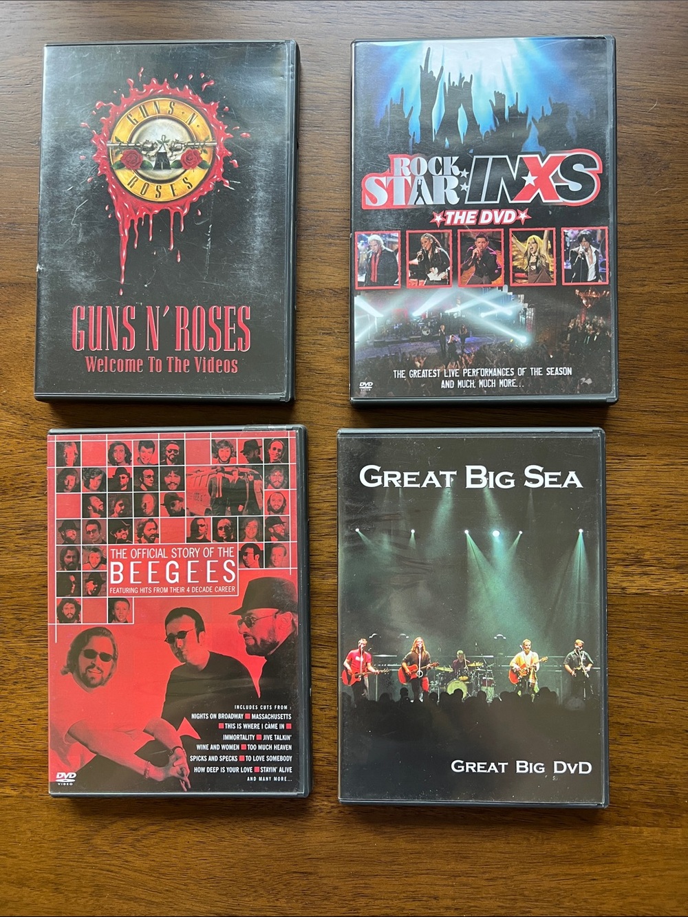 Guns N' Roses, INXS, Bee Gees & Great Big Sea DVD Lot - Black/Red/Blue